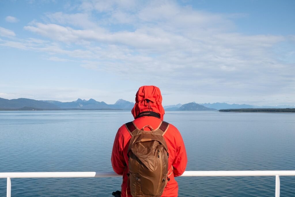 men's layering system for outdoor activities orange jacket, man, nature, mountains, landscape